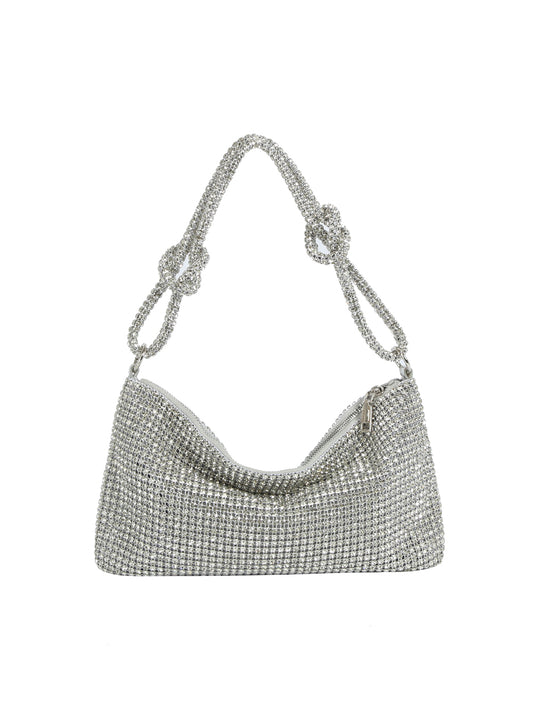 Silver beaded handbag on a white background