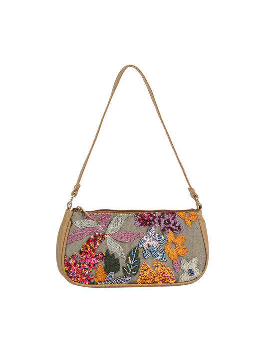 Floral embroidered handbag with a beige strap on a white background