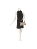 Calin Heart Lock Baguette Shoulder Bag