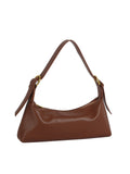 Brown handbag with a shoulder strap on a white background