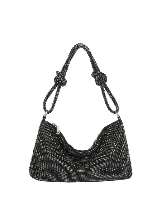 Black beaded handbag with knotted handle on a white background