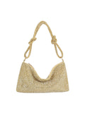 Gold beaded handbag on a white background