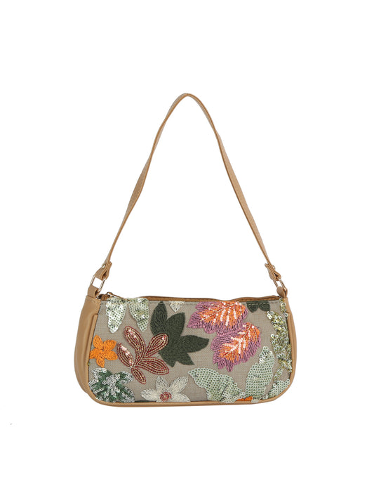 Floral embroidered handbag with a beige strap on a white background