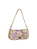 Floral patterned handbag with a strap on a white background