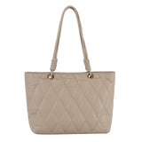 Quilted shopper tote with knot detailed handle