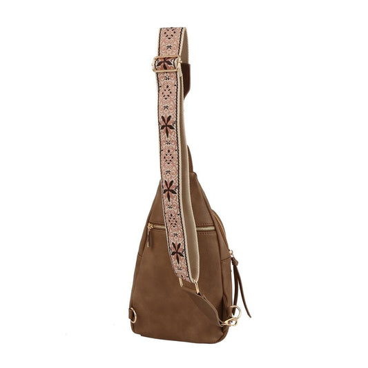 Guitar strap sling backpack with snap closing front flap